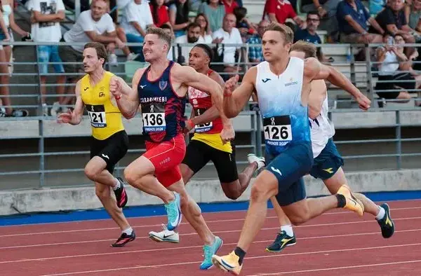 Marek sets the record in the 100, his the provincial record